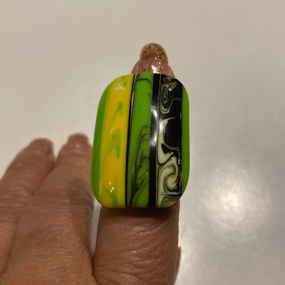 NEW Women’s Black with Green, Yellow, and White Plastic Ring. Size 5